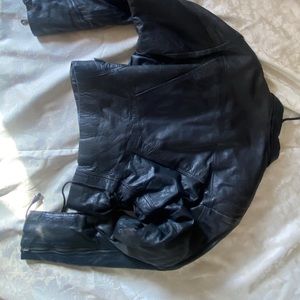 Real leather women’s black motorcycle jacket size medium fits more like a small